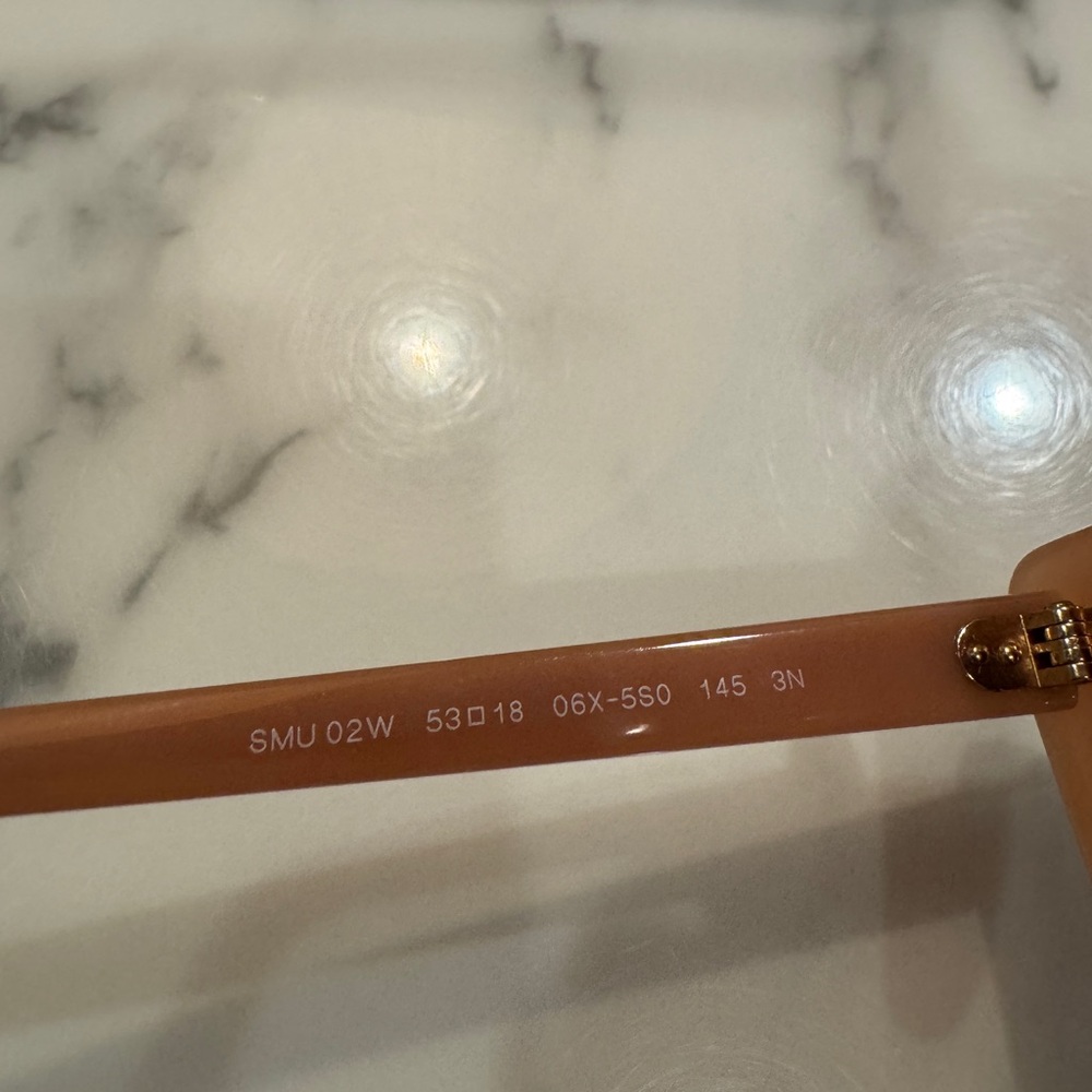 Miu Miu Blush Sunglasses made in Italy 
Model number SMU 02W - Picture 7 of 8